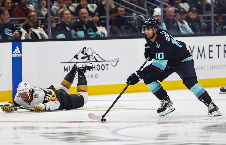With Las Vegas’ Jonathan Marchessault falling to the ice, Seattle’s Matty Beniers presses an attack in the first period. 223408