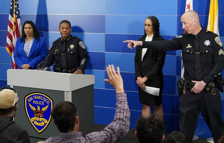 San Francisco Police Chief William Scott, second from left, answers questions from reporters during a press conference where officials announced the arrest of a suspect in the homicide investigation of Robert Lee, Thursday, April 13, 2023, in San Francisco. (AP Photo/Godofredo A. Vásquez) CAGV407 CAGV407