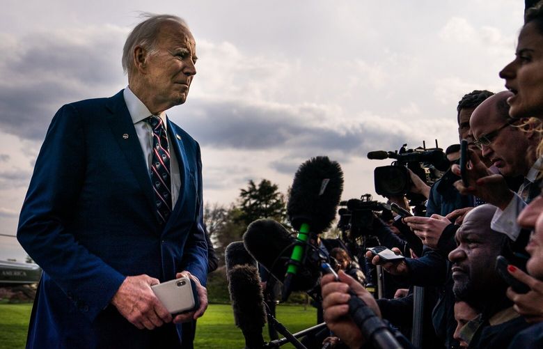 President Biden speaks with the press on the South Lawn of the White House on March 28. MUST CREDIT: Washington Post photo by Demetrius Freeman