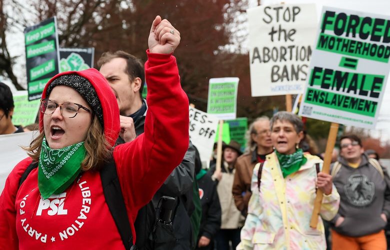 Taylor Young belts out the chant during the Defend Abortion Medication – Legal Abortion Nationwide Now march Saturday afternoon starting from Cal Anderson Park in Seattle, Washington on April 15, 2023.