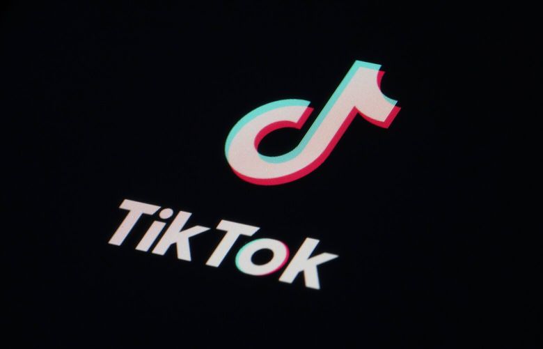 FILE – The icon for the video sharing TikTok app is seen on a smartphone, Feb. 28, 2023, in Marple Township, Pa. Montana lawmakers were expected to take a big step forward Thursday, April 13, 2023 on a bill to ban TikTok from operating in the state. It’s a move that’s bound to face legal challenges but also serve as a testing ground for the TikTok-free America that many national lawmakers have envisioned. (AP Photo/Matt Slocum, File) NYPS206 NYPS206