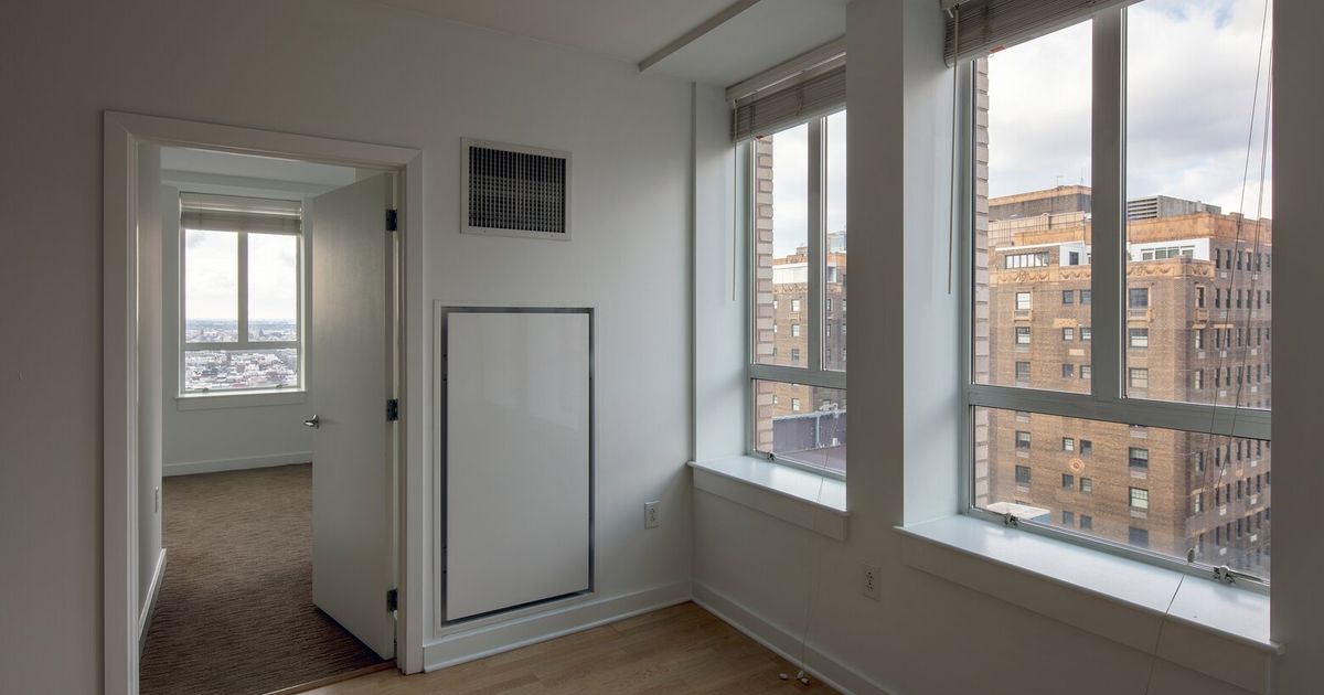 How to make a fading office building into a highrise apartment The