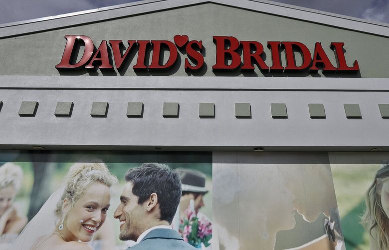 FILE – The David’s Bridal shop is shown Nov. 19, 2018, in Tampa, Fla. David’s Bridal filed for bankruptcy protection Monday, April 17, 2023 the second time that the firm has sought such protection in the last five years. The announcement came just days after the company, one of the largest sellers of wedding gowns and formal wear, said it could be eliminating 9,236 positions across the United States. The Conshohocken, Pennsylvania-based retailer employs more than 11,000 workers, (AP Photo/Chris O’Meara, file) NYPS203 NYPS203