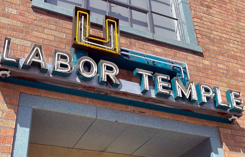 NOW: The Labor Temple sign that originally shone from its front entrance on First Avenue now tops its Clay Street entrance, augmented by a yellow “u” in line with the building’s rebranding.