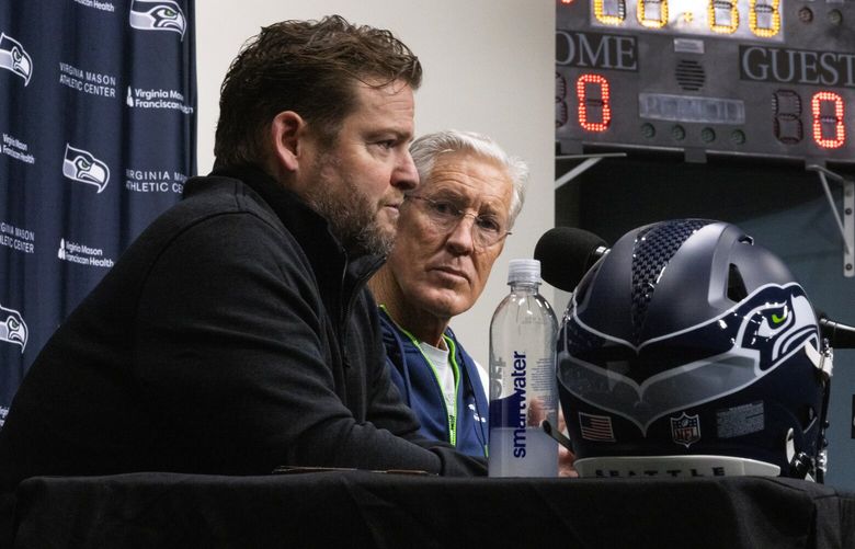 Seahawks general manager John Schneider, left, and head coach Pete Carroll meet with reporters for a pre-draft press conference, Wednesday, April, 19 2023 in Renton.