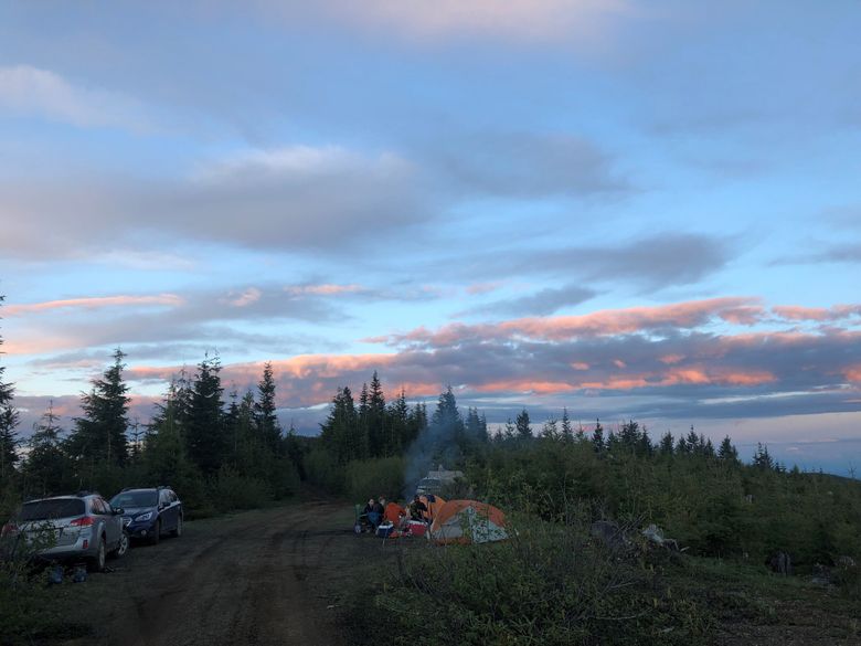 Dispersed camping, like this group in the Olympic National Forest, offers the convenience of car camping but more privacy and remoteness than a developed campground. (Courtesy of U.S. Forest Service)