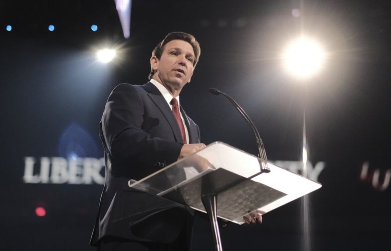 Gov. Ron DeSantis during an event at Liberty University in Lynchburg, Va, on April 14, 2023. DeSantis and former President Donald Trump are the top two names in the Republican presidential primary; the groups supporting them are already spending millions. (Eze Amos/The New York Times) XNYT179 XNYT179