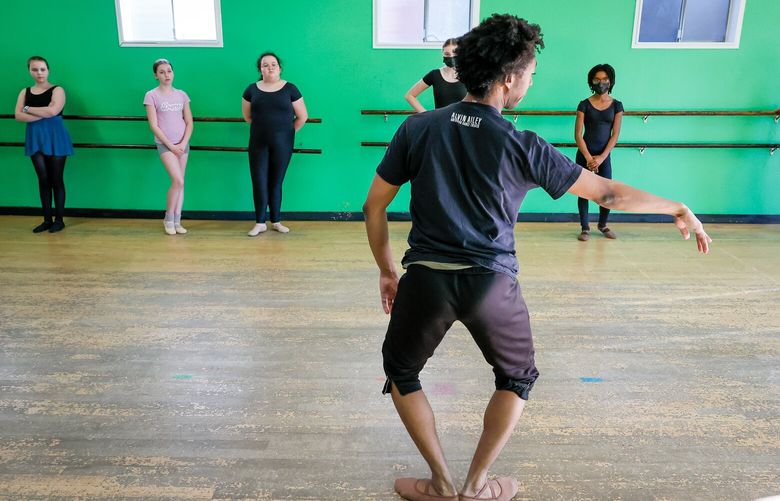 Robbie Moore leads a ballet class Tuesday afternoon at the Rainier Dance Center in Seattle, Washington on April 4, 2023.