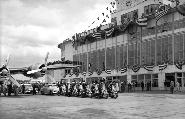 A motorcade leads the way for Haile Selassie, emperor of Ethiopia from 1930 to 1974, after he arrived at the Seattle-Tacoma International Airport in 1954. (Port of Seattle)