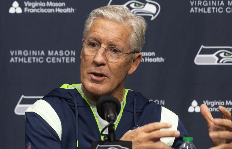 Seahawks general manager John Schneider, left, and head coach Pete Carroll meet with reporters for a pre-draft press conference, Wednesday, April, 19 2023 in Renton.
