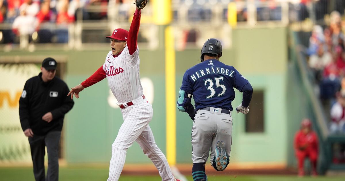 Trea Turner lines into a force out, shortstop Edmundo Sosa to