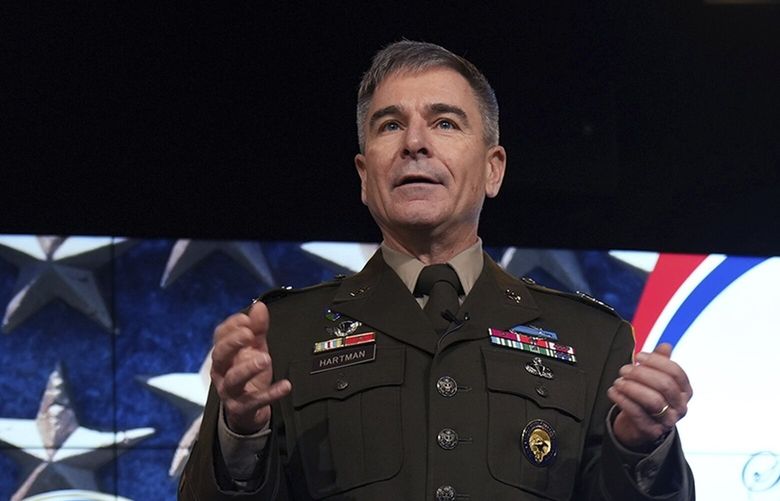 FILE – In this image provided by U.S. Cyber Command, Army Major Gen. William Hartman, commander of U.S. Cyber Command’s Cyber National Mission Force, speaks during a ceremony at U.S. Cyber Command headquarters at Fort George E. Meade, Md., on Dec. 19, 2022. Before the 2020 presidential election, Iranian hackers broke into to a system used by an unidentified local government to support its election night operations but were kicked out before any attack could be launched, according to U.S. military and cybersecurity officials. (U.S. Navy Chief Petty Officer Jon Dasbach/U.S. Cyber Command via AP) WX105 WX105