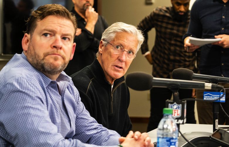 John Schneider and Pete Carroll talk about  Charles Cross, an offensive lineman out of Mississippi State, who was taken by the Seahawks in the first round of the NFL Draft  Thursday, April 28, 2022. 220256 (Dean Rutz / The Seattle Times)