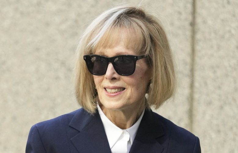Former advice columnist E. Jean Carroll, second from right, arrives to federal court in New York, Wednesday, April 26, 2023. Jurors have been seated in the trial over Carroll’s claim that former President Donald Trump raped her nearly three decades ago in a department store dressing room. (AP Photo/Seth Wenig) NYSW101 NYSW101