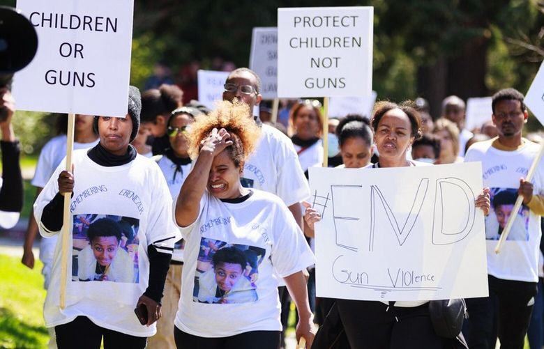Family – including aunt Marta Woldemariam, center – students and community march near Ingraham High School to honor Ebenezer Haile, 17, who was shot and killed at school last November, in Seattle on Wednesday April 26, 2023. 223683