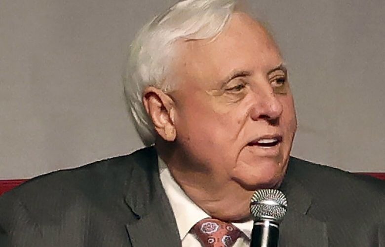 Gov. Jim Justice speaks during an announcement for his campaign for U.S. Senate at The Greenbrier Resort in White Sulphur Springs, W.Va., on Thursday, April 27, 2023. (AP Photo/Chris Jackson) WVCJ111 WVCJ111