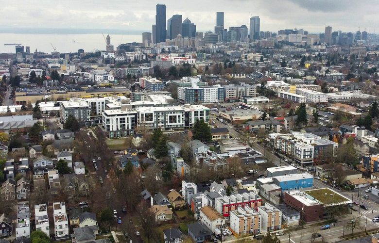 Central District single family homes, town houses and apartments are seen from the air from Leschi, Tuesday, Dec. 13, 2022 in South Seattle.