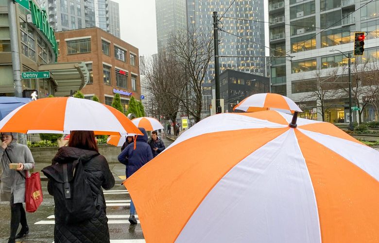 The ubiquitous orange and white Amazon umbrellas seen in South Lake Union on Feb. 6, 2020, shortly before the emptied out due to COVID.