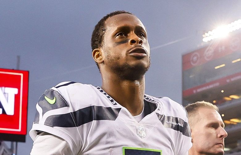 Seattle Seahawks quarterback Geno Smith walks off the field after a 41-23 loss to the San Francisco 49ers in the NFC Wildcard game. 222772