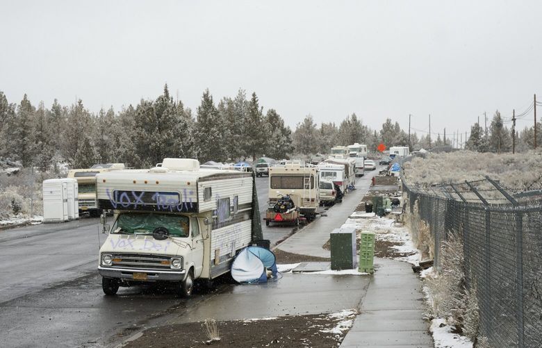 Vehicles parked along Hunnell Road in Bend, Ore., which has become an encampment for people experiencing homelessness, on March 14, 2023. As housing costs have strained the budgets of Bend’s nurses, teachers and police officers, homelessness has soared in the city of 100,000 people, much as it has in far larger West Coast cities. (Joe Kline/The New York Times) XNYT65 XNYT65