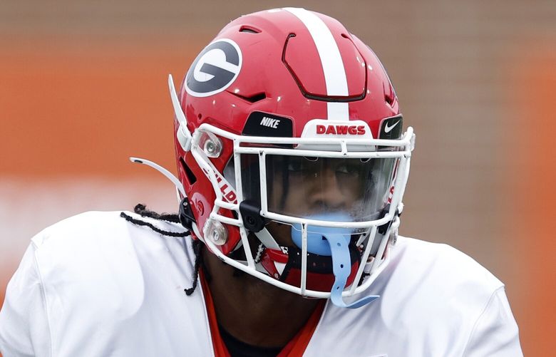 American running back Kenny McIntosh of Georgia (6) runs through drills during practice for the Senior Bowl NCAA college football game Thursday, Feb. 2, 2023, in Mobile, Ala.. (AP Photo/Butch Dill)
