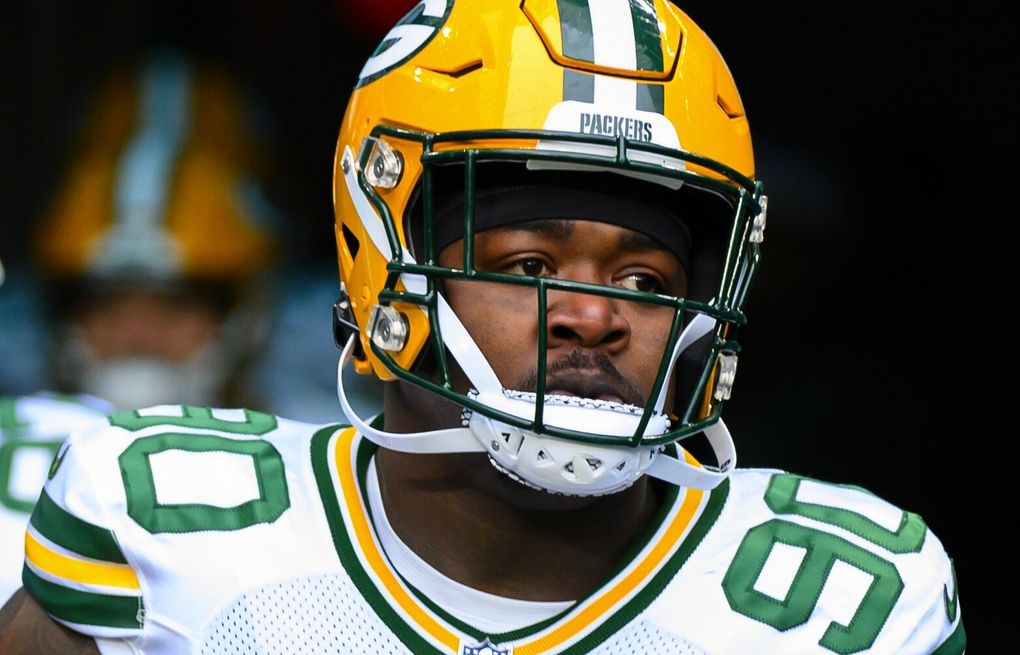 Green Bay Packers defensive tackle Jarran Reed (90) walks on the