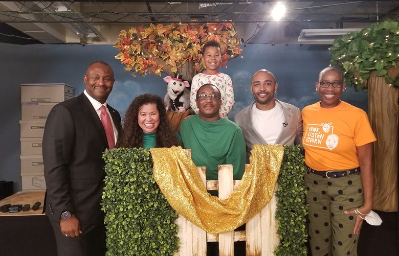 On set at LL+L TV’s “Sip, Savor + Share” event. From left: Howard Brantley (former Board President), Tamara Horn, Possum, Solomon Horn, Elijah Horn, Doug Baldwin (former Seahawk) and Val-Thomas Matson (Founder, Executive Producer and “Auntie Lena”)