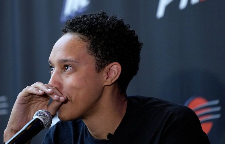 WNBA basketball player Brittney Griner fights back tears at a news conference, Thursday, April 27, 2023, in Phoenix. (AP Photo/Matt York) AZMY122 AZMY122