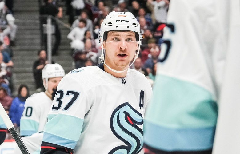 Yanni Gourde talks strategy on the faceoff with Adam Larsson in the second period. 223705