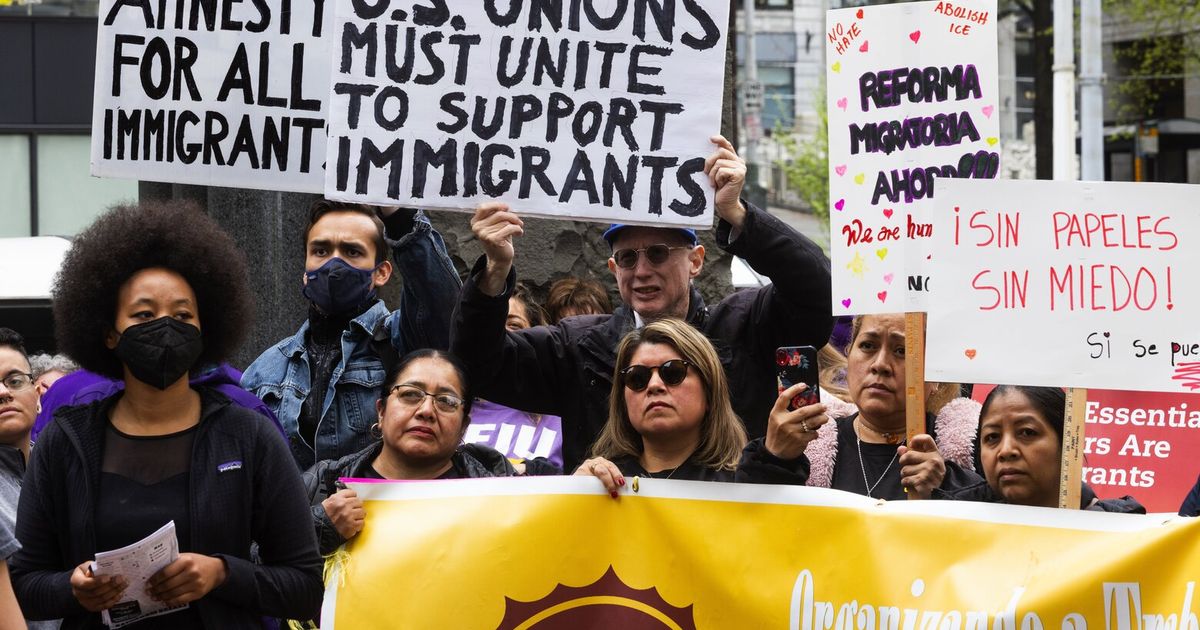 May Day Seattle Hundreds march for worker, immigrant rights The