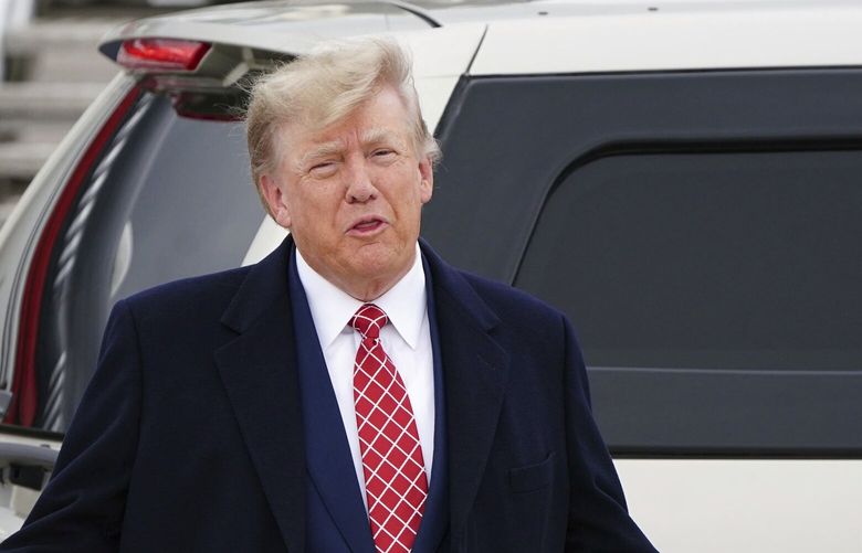 Former US president Donald Trump arrives at Aberdeen International Airport ahead of his visit to the Trump International Golf Links Aberdeen, in Dyce, Aberdeen, Scotland, Monday May 1, 2023. (Jane Barlow/PA via AP) ABE802 ABE802