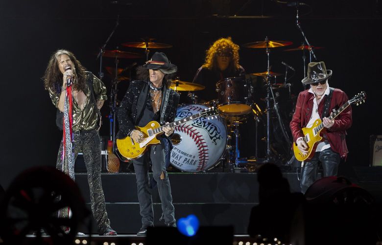 FILE – Tom Hamilton, from left, Steven Tyler, Joe Perry, John Douglas and Brad Whitford of Aerosmith, perform on Sept. 8, 2022, at Fenway Park in Boston. Aerosmith will be touring a city near you for the last time to celebrate their 50-plus years of being together. The Rock & Roll Hall of Fame band announced Monday, May 1, 2023 the dates for their farewell tour called “Peace Out” starting Sept. 2 in Philadelphia. (Photo by Winslow Townson/Invision/AP, file) NYPS305 NYPS305