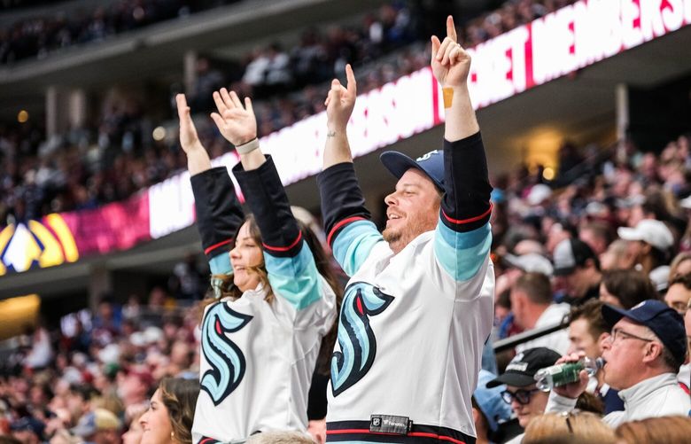 Seattle fans cheer the Kraken’s second goal in the second period. 223705