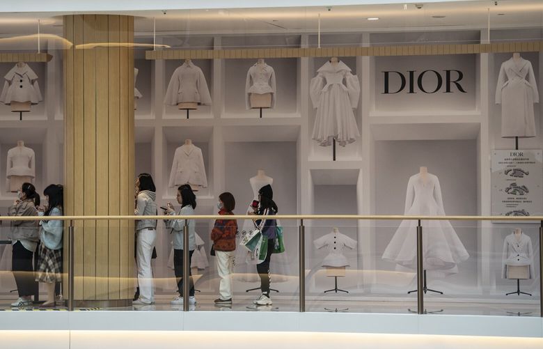 A line at the Dior store at Plaza 66 in Shanghai, April 23, 2023. The end of pandemic-era restrictions has unleashed a luxury spending rebound in China. (Qilai Shen/The New York Times) 