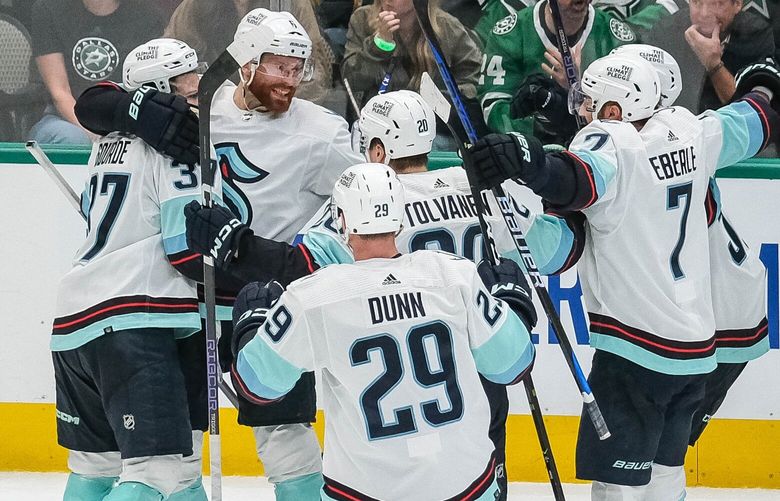 The Kraken celebrates Yanni Gourde’s overtime goal that gave Seattle a 5-4 win over the Stars in Game 1 of the second round of the Stanley Cup Playoffs. 223713