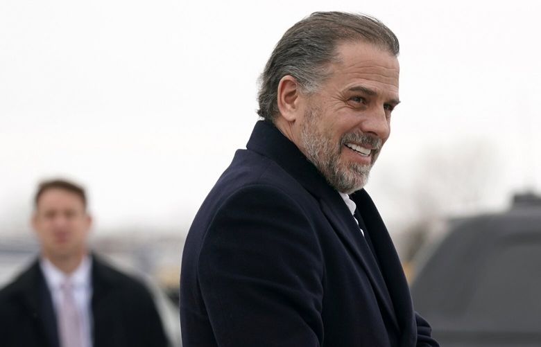 FILE – Hunter Biden, son of President Joe Biden, boards Air Force One with the president, Saturday, Feb. 4, 2023, at Hancock Field Air National Guard Base in Syracuse, N.Y. An IRS special agent is seeking whistleblower protection to disclose information regarding what the agent contends is mishandling of an investigation into President Joe Biden’s son, Hunter Biden. That is according to a letter to Congress obtained by The Associated Press. (AP Photo/Patrick Semansky, File) WX102 WX102