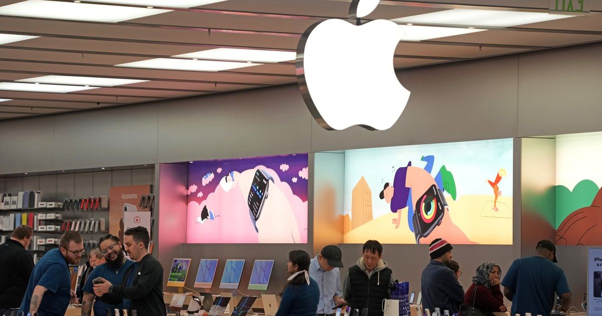 Orlando, FL USA - November 20, 2020: Salespeople and customers at an Apple  store looking at the latest Apple products for sale Stock Photo - Alamy