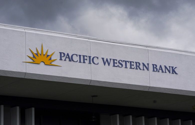 A Pacific Western Bank branch, as seen on Thursday, May 4, 2023, in Whittier, Calif. Shares of regional lender PacWest Bank plunged nearly 50% Thursday after the company confirmed reports that it was considering “strategic options” that may include the possible sale of the company. (AP Photo/Ashley Landis)
