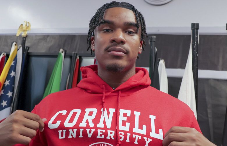 Dennis “Maliq” Barnes, 16, announces that he will be attending Cornell University during a news conference at International High School of New Orleans Friday, May 5, 2023. Barnes received more than 180 college acceptance letters and nabbed more than $10 million in scholarship offers, a new national record that brought international media attention. He will be enrolling in the college of engineering in the fall. (David Grunfeld, NOLA.com/The Times-Picayune/The New Orleans Advocate via AP) LAORS201 LAORS201