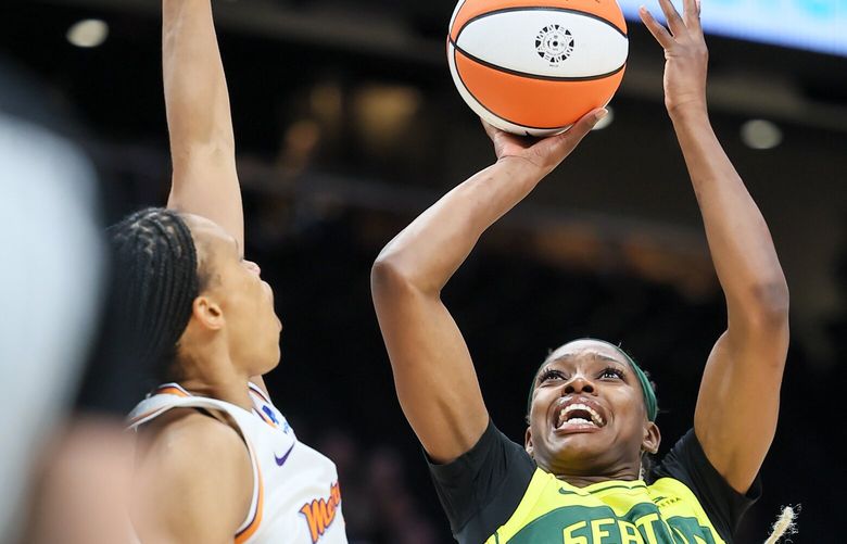 Seattle Storm’s Kaila Charles attempts a shot over Phoenix Mercury’s Brianna Turner Monday evening at Climate Pledge Arena in Seattle, Washington on May 8, 2023. The Storm lead 43-36 at the half.