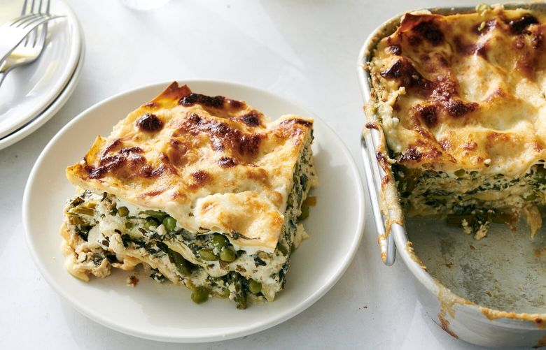 White lasagna in New York, April 20, 2023. Layered with asparagus, spinach, peas and lemony ricotta, this springy recipe from Melissa Clark is the cheesy dish for right now. Food styled by Simon Andrews. (David Malosh/The New York Times) XNYT197 XNYT197