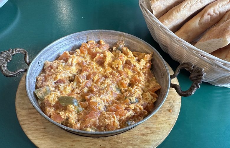 The scrambled eggs with tomato and green pepper at Renton’s Cafe Sabah are like fluffy pillows served with puffy pide bread.