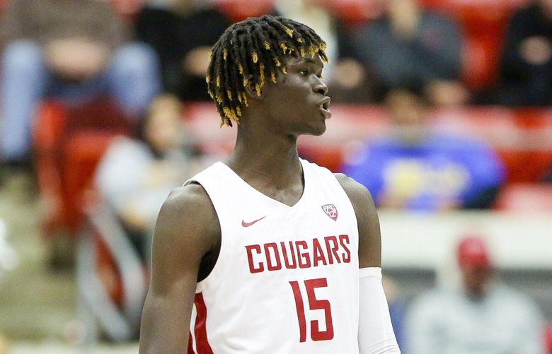 Washington State center Adrame Diongue stands on the court during the second half of an NCAA college basketball game against UCLA, Friday, Dec. 30, 2022, in Pullman, Wash. (AP Photo/Young Kwak) OTK