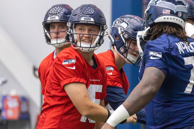 Seattle Seahawks quarterback Holton Ahlers looks to pass against