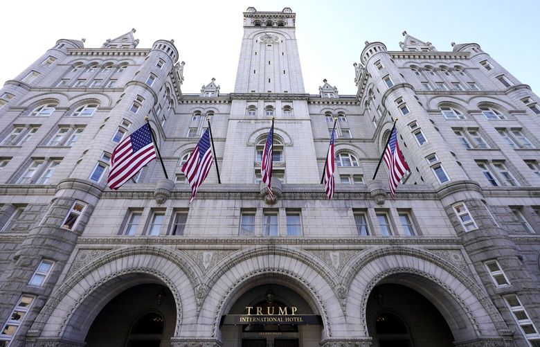 FILE – A view of The Trump International Hotel is seen, March 4, 2021, in Washington. The Supreme Court has agreed to hear a Biden administration appeal to limit lawsuits filed by members of Congress against the federal government, in a case that stems from disputes over what was the Trump International Hotel in Washington.  (AP Photo/Julio Cortez, File) WX101 WX101