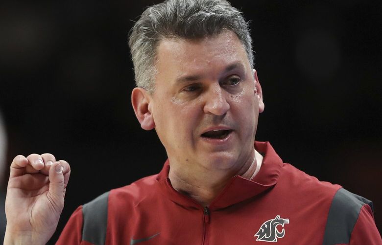 Washington State head coach Kyle Smith talks with the bench during an NCAA college basketball game against Oregon State on Monday, Feb. 28, 2022, in Corvallis, Ore. Washington State won 103-97. (AP Photo/Amanda Loman)
