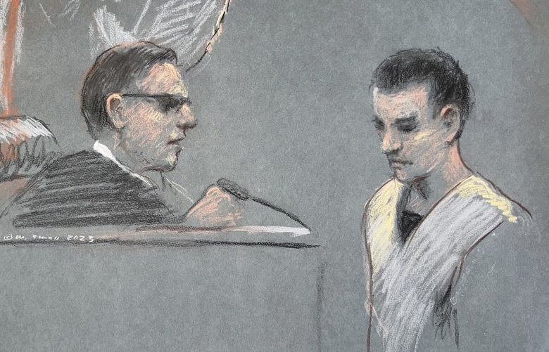 FILE – The artist sketch depicts Massachusetts Air National Guardsman Jack Teixeira, right, appearing in U.S. District Court in Boston, April 14, 2023. A bipartisan group of senators has introduced legislation that would require the National Archives to screen documents leaving the White House for classified material. It’s the first major proposal to respond to a series of intelligence breaches over the last year. (Margaret Small via AP)