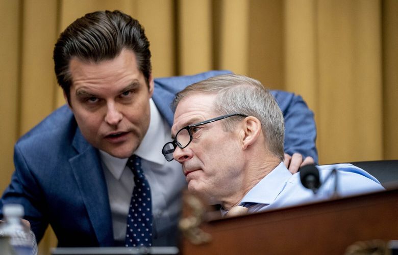 Rep. Matt Gaetz, R-Fla., left, speaks with Chairman Rep. Jim Jordan, R-Ohio, during a House Judiciary subcommittee hearing on what Republicans say is the politicization of the FBI and Justice Department and attacks on American civil liberties, on Capitol Hill in Washington, Thursday, May 18, 2023. (AP Photo/Andrew Harnik) DCAH151 DCAH151