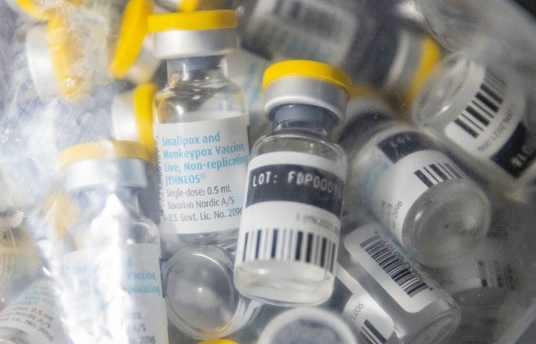 Vials of single doses of the Jynneos vaccine for monkeypox are seen from a cooler at a vaccinations site on Monday, Aug. 29, 2022, in the Brooklyn borough of New York. (AP Photo/Jeenah Moon) NYJHM101