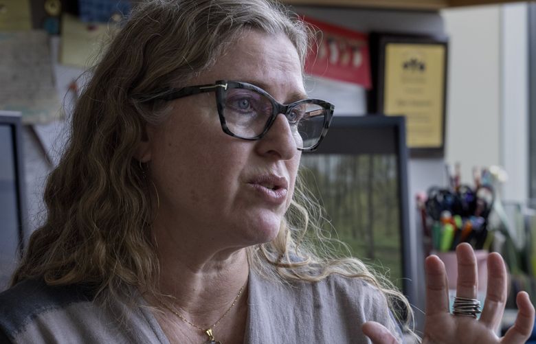 Piper Sangston, a MHAT counselor at Sammamish High School in Bellevue, talks about the mental health program (MHAT) that is offered to students at the school, shot May 9, 2023.  

The Bellevue school district screens middle and high schoolers for mental health.



 223734 (Ellen M. Banner / The Seattle Times)